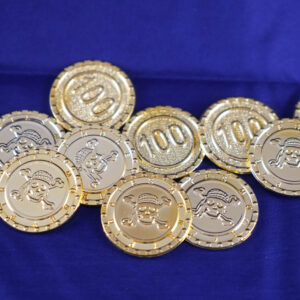 Gouden piratenmunten met doodshoofd