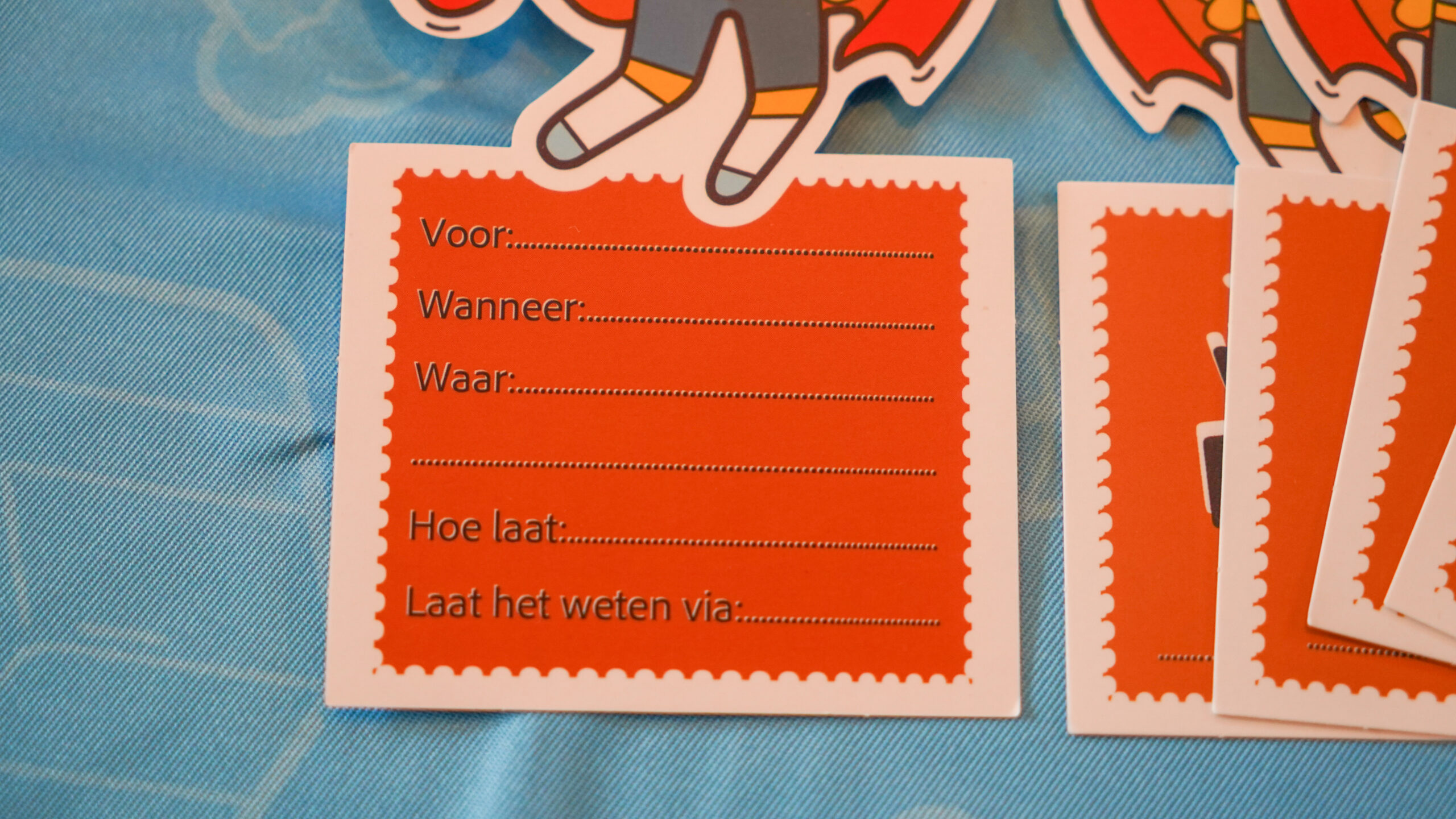 Uitnodigingskaart voor een superheldenfeest